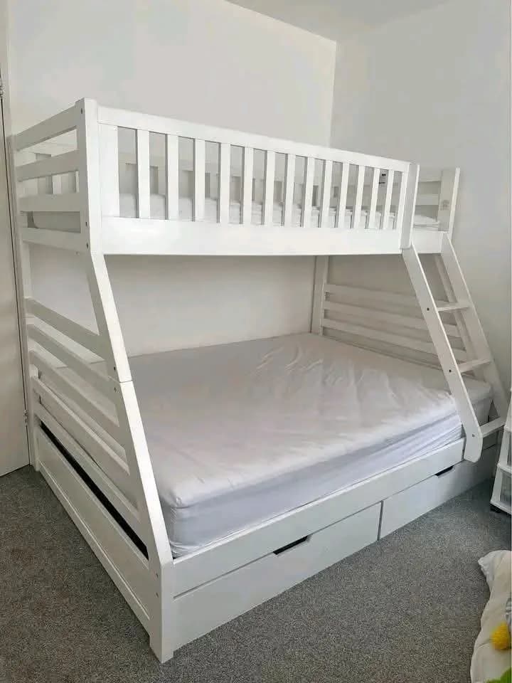 Sophisticated Curved White Bunk Bed with Multiple Clothes Drawers