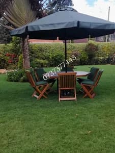 6-seater outdoor garden set with cushions and wooden chairs
