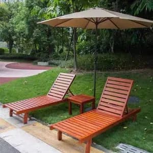 Parasol with 2 Mahogany Sun Loungers with a Centre Table