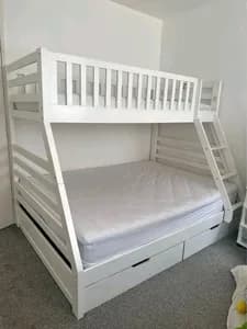Sophisticated Curved White Bunk Bed with Multiple Clothes Drawers