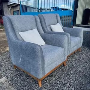 Wing Chairs Grey in Color Fabric and Some Mahogany Touches