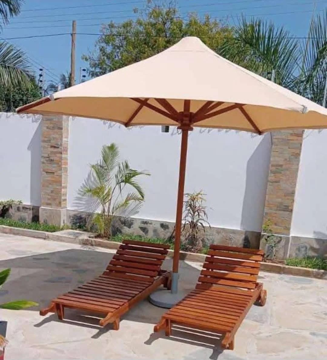 Parasol with 2 sun loungers